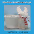 Christmas ceramic tealight holder in red reindeer and white snowball